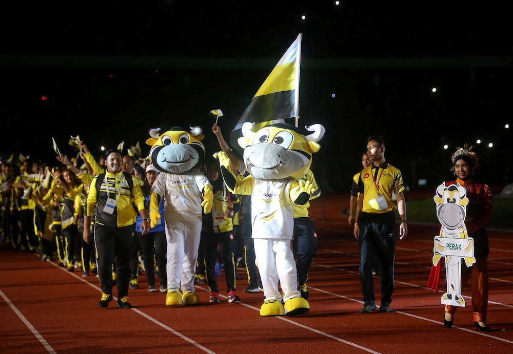 The seladang mascot, Chor leads the Perak contingent at the march past of the 19th Sukma closing ceremony at the Perak Stadium in Ipoh. September 22, 2018 u00e2u20acu201d Farhan Najib Yusoffn