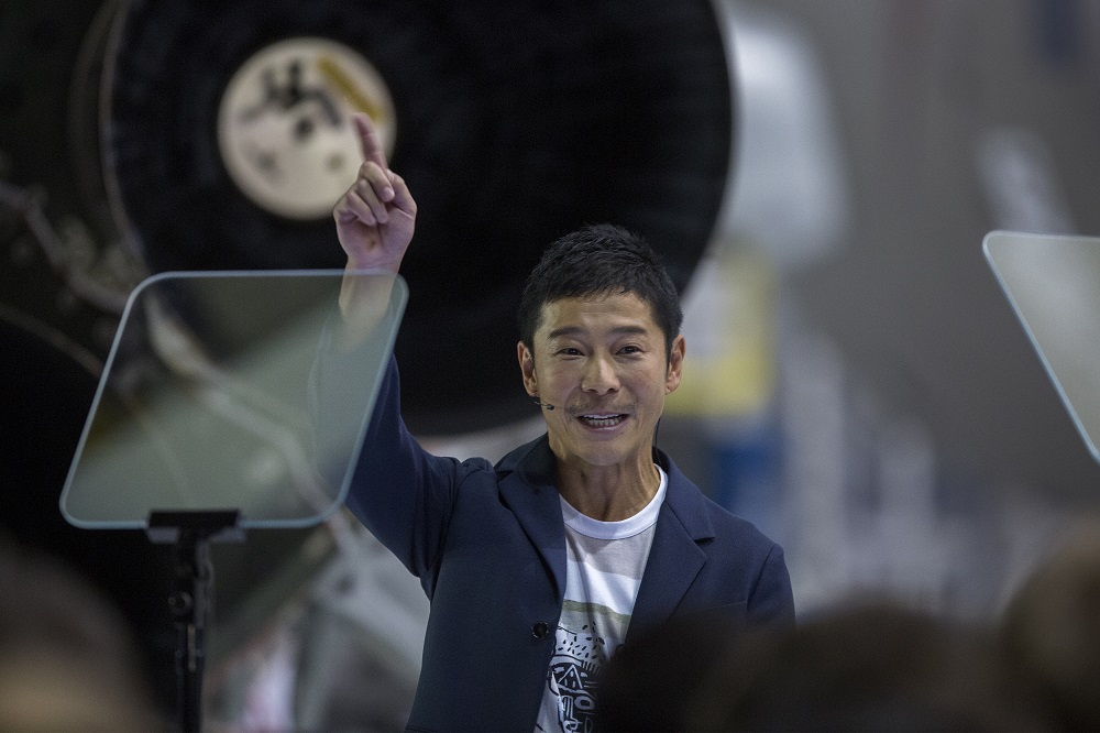 Japanese billionaire Yusaku Maezawa reacts near a Falcon 9 rocket at the SpaceX headquarters in Hawthorne, California September 17, 2018. u00e2u20acu201d AFP pic