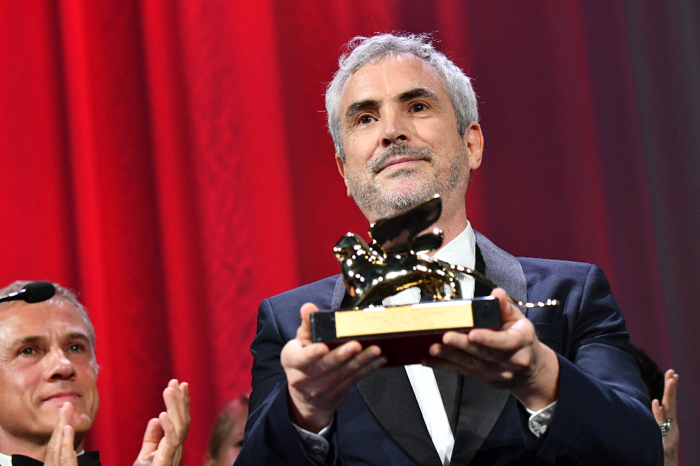 Director Alfonso Cuaron with the Golden Lion for u00e2u20acu02dcRomau00e2u20acu2122 at the 75th Venice Film Festival on September 8, 2018. u00e2u20acu201d AFP pic
