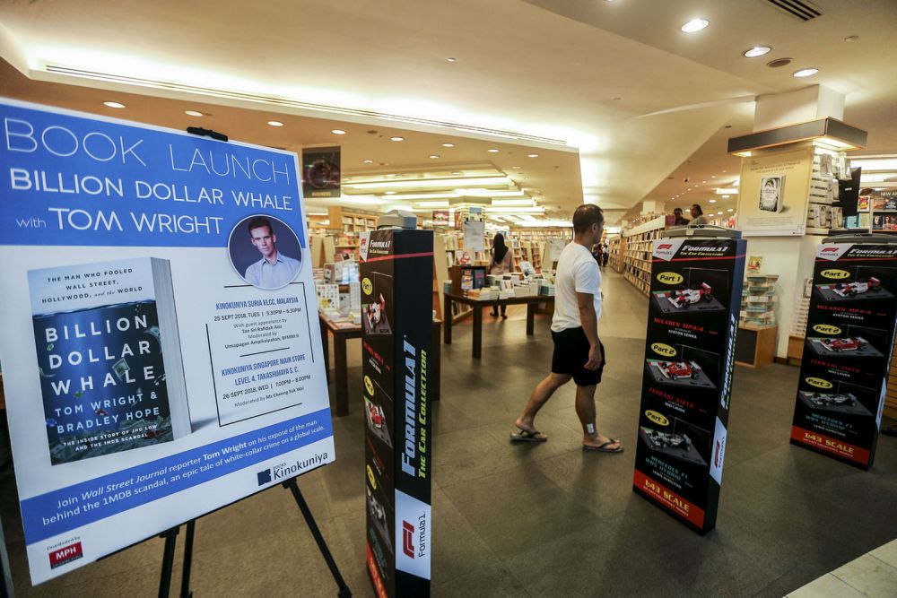 A poster detailing the launch of the 'Billion Dollar Whale' is pictured at the entrance of Kinokuniya, Suria KLCC, Kuala Lumpur on September 17, 2018. u00e2u20acu201d Picture by Hari Anggara