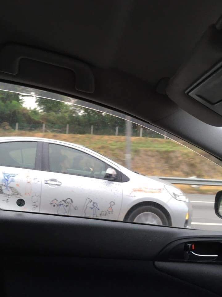 Decked in doodles, the eye-catching car is proof of a proud parent. u00e2u20acu201d Picture via Twitter