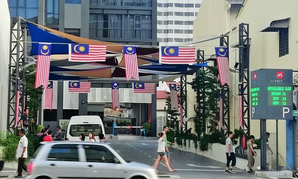 An LED display (right) indicates what type of parking bays are still available: SUV, MPV and sedan. — Picture courtesy of M Summit Group