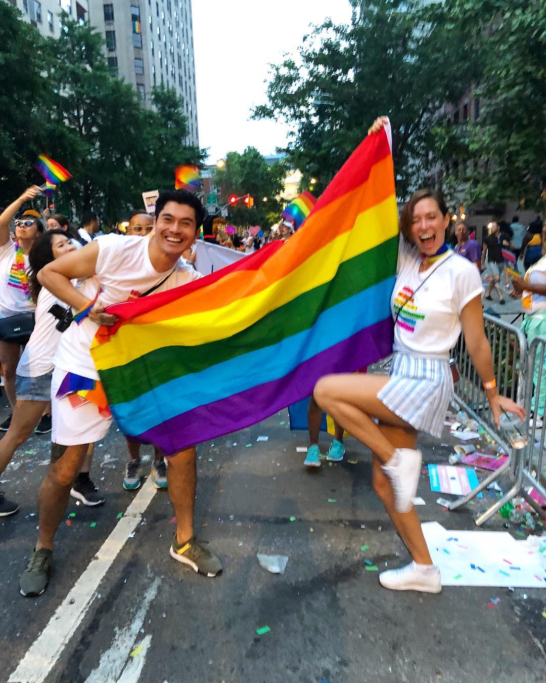 Henry and his wife Liv Lo at the annual Pride parade in Manhattan, New York. — Picture via Instagram/Henry Golding