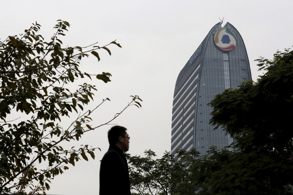 A man walks in front of Tencent headquarters in Shenzhen, China March 15, 2016. u00e2u20acu201d Reuters pic