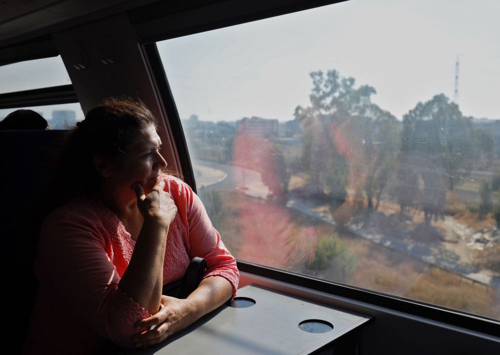 Commuters are seen at the new high speed train travelling between Jerusalem and Israel's Ben Gurion International Airport. u00e2u20acu201d AFP pic