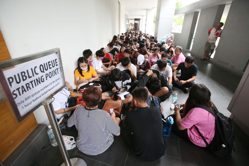 Fans waiting patiently for ticketing counters to open. — Picture by Azinuddin Ghazali