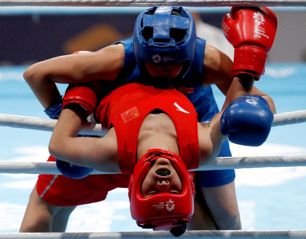 Chang Yuan of China in action with Pang Chol Mi of North Korea, Jakarta Sept 1, 2018. u00e2u20acu201d Reuters pic