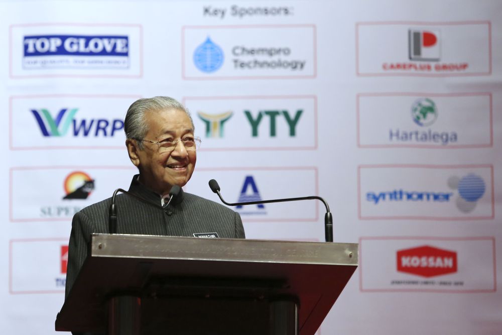 Prime Minister Tun Dr Mahathir Mohamad speaks during the 9th International Rubber Glove Conference and Exhibition in Kuala Lumpur September 4, 2018. u00e2u20acu2022 Picture by Yusof Mat Isa