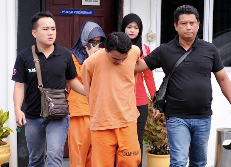 Muhammad Lukman and his wife Nadiah Rahmat are brought to the Telok Datok Magistrateu00e2u20acu2122s Court in Banting, Kuala Langat December 7, 2017. u00e2u20acu201d Bernama pic