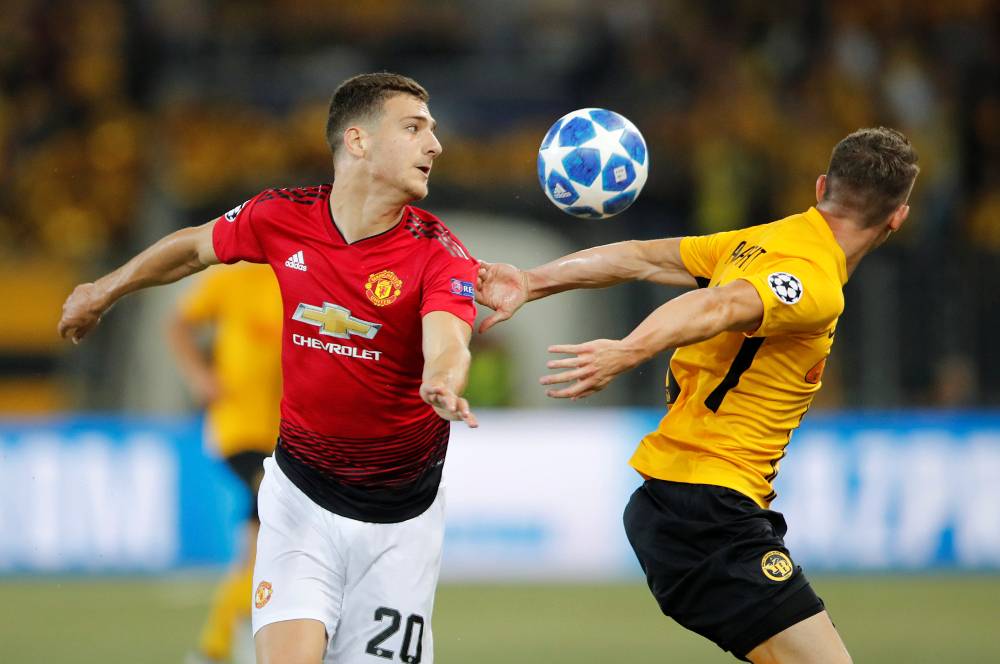 Manchester Unitedu00e2u20acu2122s Diogo Dalot in action with Young Boysu00e2u20acu2122 Christian Fassnacht during their Champions League Group H match at Stade de Suisse, Bern September 19, 2018. u00e2u20acu201d Reuters pic