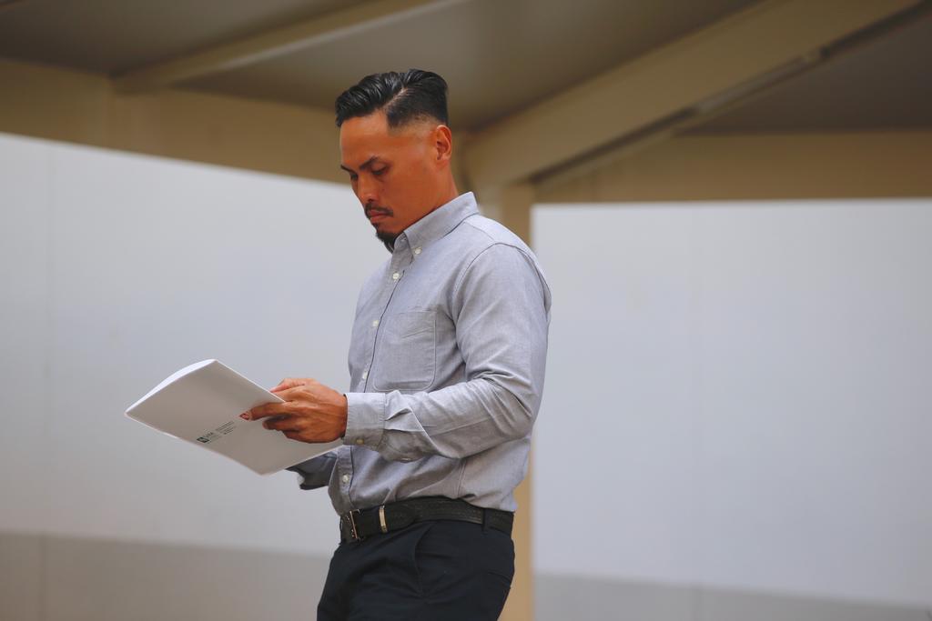 Nazhan Mohamed Nazi, 40, faces one charge of abetting intentionally by aiding a group of servicemen to cause grievous hurt. He is the deputy commander of a team of SCDF personnel at Tuas View Fire Station. u00e2u20acu201d Najeer Yusof/TODAY pic