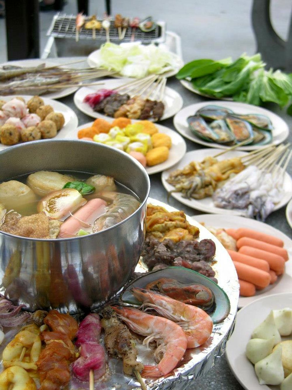 If you can’t decide between having a steamboat party or a barbeque feast, Village BBQ Steamboat lets you do both. ― Picture via Facebook/Village BBQ Steamboat Sdn Bhd