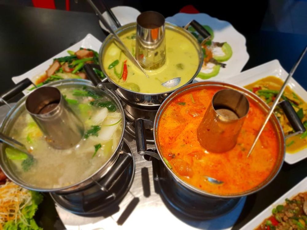 A trinity of delicious soup bases to please all palates. ― Picture via Facebook/Moo-Ka-Ta Krua Thai
