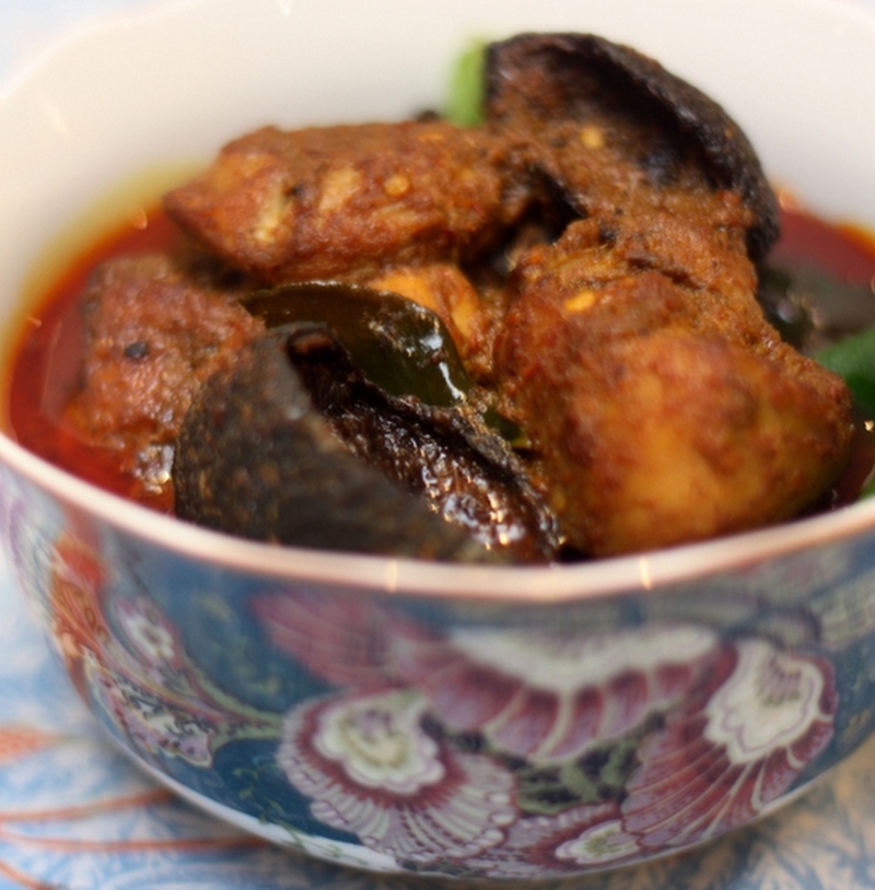 'Ayam buah keluak' is one of the dishes served in the 'Melaka Tok Panjang' dinner.