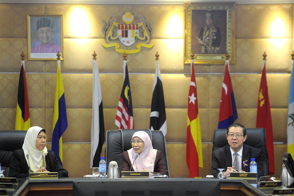 Deputy Prime Minister Datuk Seri Wan Azizah Wan Ismail (centre) chairs the 72nd National Council for Local Government meeting at Putrajaya September 6, 2018. u00e2u20acu2022 Picture by Shafwan Zaidon