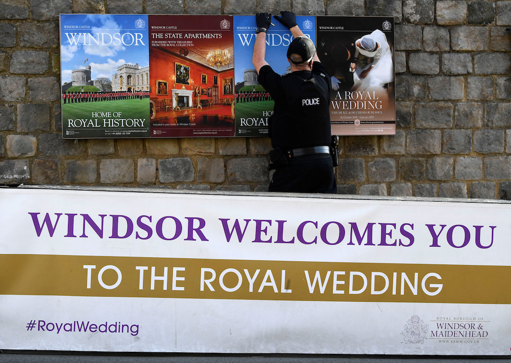 A police officer makes security checks around the castle, on the day before the royal wedding of Britain's Princess Eugenie and Jack Brooksbank, in Windsor October 11, 2018. u00e2u20acu201d Reuters pic