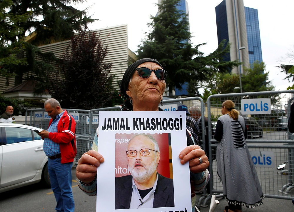 A human rights activist holds picture of Saudi journalist Jamal Khashoggi during a protest outside the Saudi Consulate in Istanbul October 9, 2018. u00e2u20acu201d Reuters pic