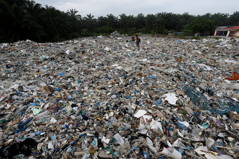 Plastic waste is piled outside an illegal recycling factory in Jenjarom, Kuala Langat October 14, 2018. u00e2u20acu201d Reuters pic