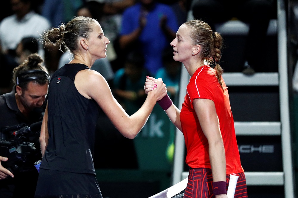 Karolina Pliskova and Petra Kvitova shake hands after their group stage match in Singapore October 25, 2018. u00e2u20acu201d Reuters pic