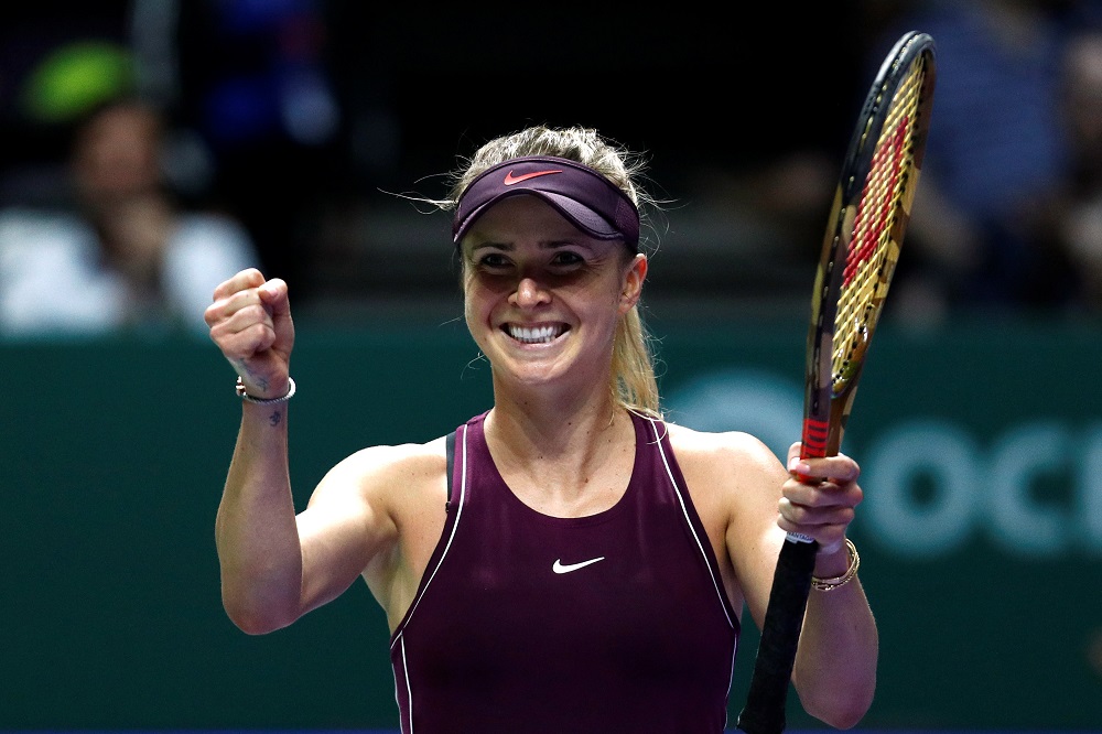 Elina Svitolina celebrates winning her group stage match against Caroline Wozniacki in Singapore October 25, 2018. u00e2u20acu201d Reuters pic
