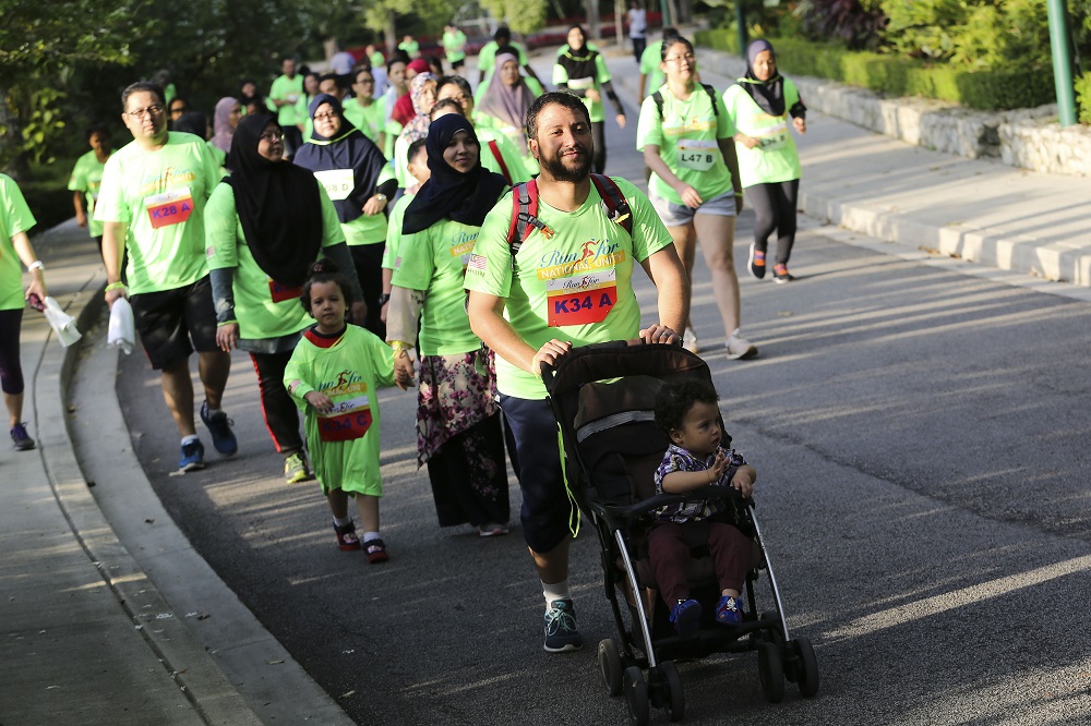 Participants taking part in the Run for National Unity event at Perdana Botanical Gardens in Kuala Lumpur October 20, 2018.