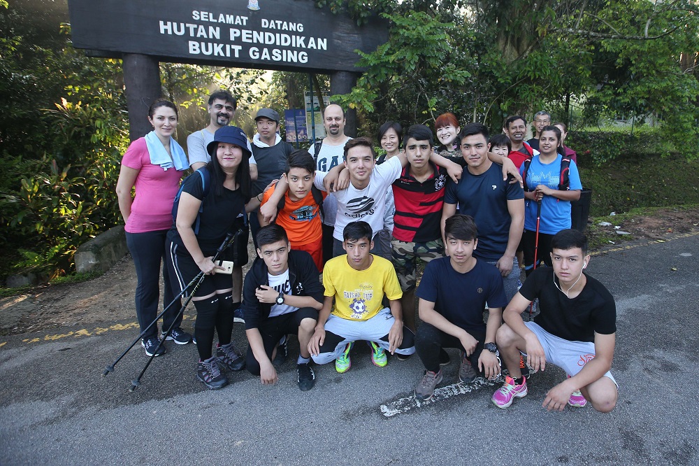 Some of the refugee children posing for a group picture before the hike at Bukit Gasing in Petaling Jaya. u00e2u20acu2022 Picture by Azinuddin Ghazali