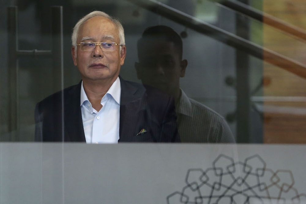 Datuk Seri Najib Razak leaves MACC headquarters in Putrajaya October 24, 2018. u00e2u20acu201d Picture by Yusof Mat Isa