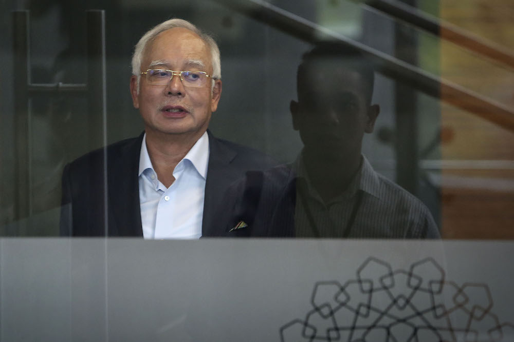 Datuk Seri Najib Razak leaves MACC headquarters in Putrajaya October 24, 2018. u00e2u20acu201d Picture by Yusof Mat Isa