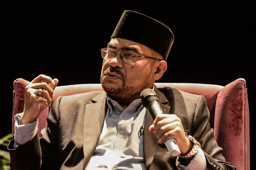 Minister in the Prime Minister's Department Datuk Mujahid Yusof Rawa speaks during a dialogue session at Universiti Malaya in Kuala Lumpur October 10, 2018. u00e2u20acu201d Picture by Miera Zulyana