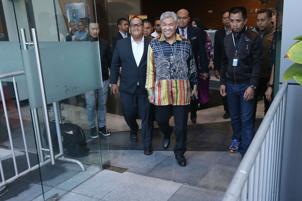 Umno President Datuk Seri Ahmad Zahid Hamidi leaves MACC headquarters in Putrajaya October 11, 2018. u00e2u20acu201d Picture by Azinuddin Ghazali