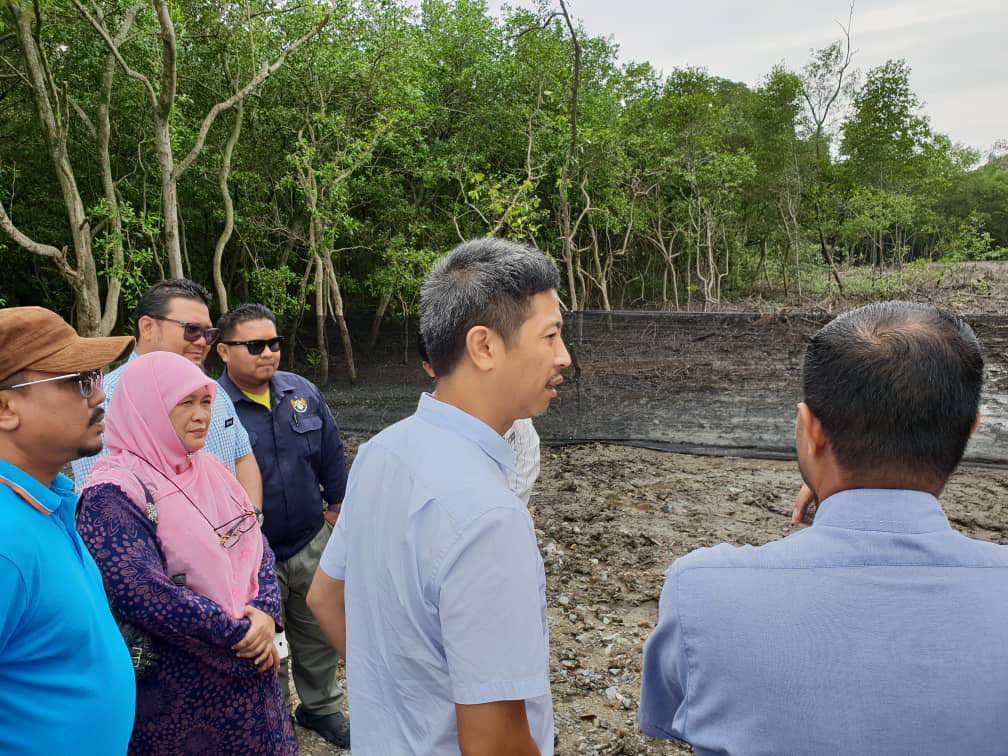 Bukit Tengah assemblyman Gooi Hsiao Leung (second right) with officers from related government agencies at the illegally cleared site in Juru. u00e2u20acu201d Pictures courtesy of Gooi Hsiao Leung