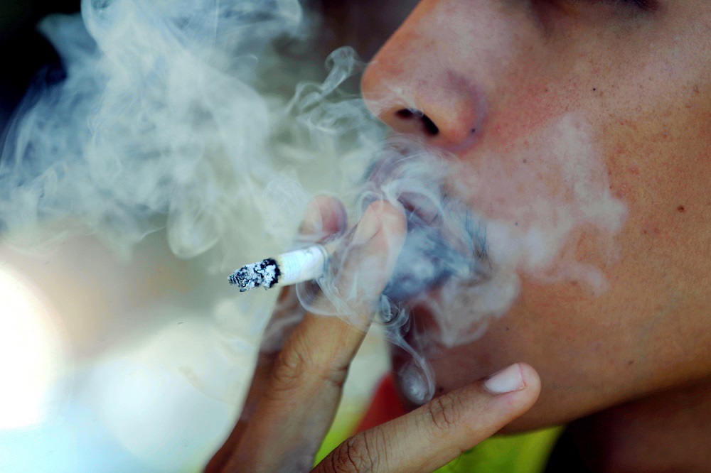 Most restaurant operators believed they would lose their smoking customers, as restaurants were among the few places people could still puff away at. u00e2u20acu201d Picture by Farhan Najib