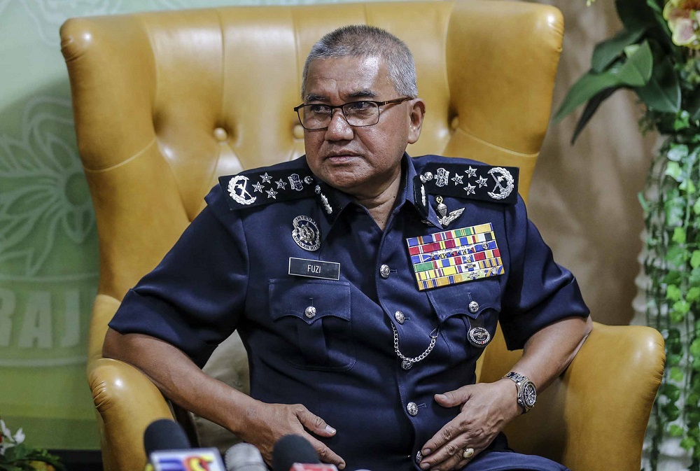 Inspector-General of Police Tan Sri Mohamad Fuzi Harun speaks during a press conference in Kuala Lumpur October 24, 2018. u00e2u20acu201d Picture by Firdaus Latif