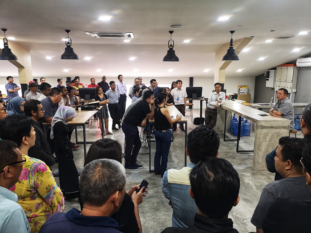 Malay Mail editor-in-chief Datuk Wong Sai Wan (far right) speaks to Malay Mail staff during a town hall meeting in Petaling Jaya October 25, 2018. — Picture by Shafwan Zaidon