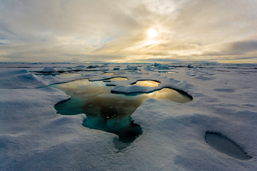 This handout image obtained via the Nature Publishing website on April 24, 2018 shows melt ponds on the Arctic sea ice in the Central Arctic. u00e2u20acu201d AFP pic      