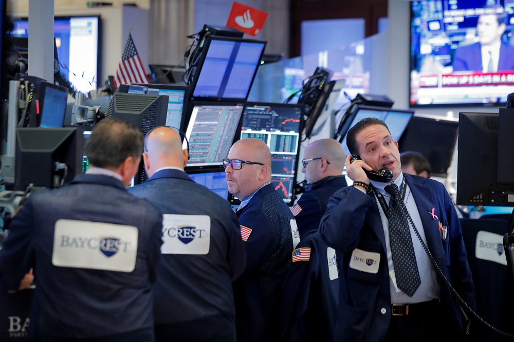 Traders work on the floor of the New York Stock Exchange in New York, October 3, 2018. u00e2u20acu201d Reuters pic