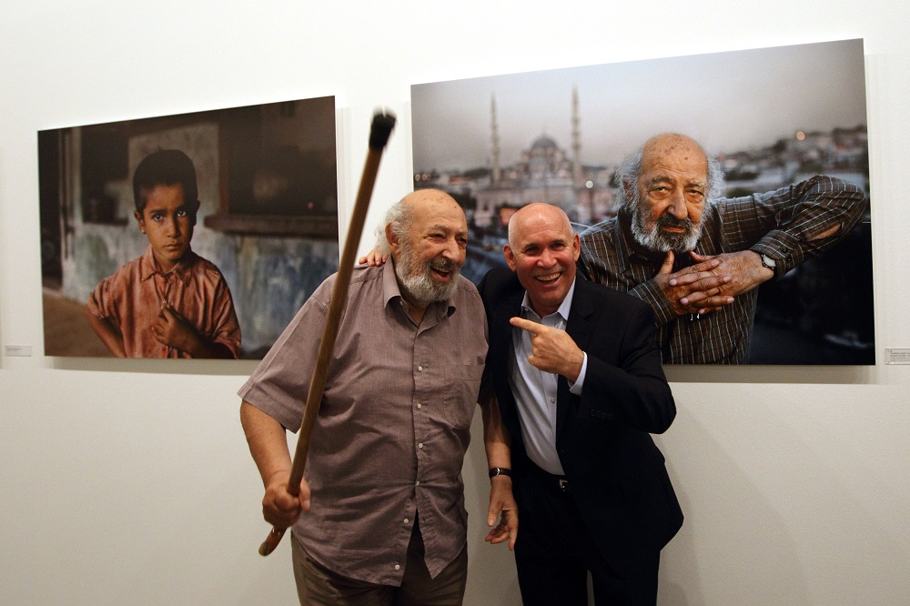 US photographer Steve McCurry (right) shares a joke with legendary Turkish photojournalist Ara Guler during the opening of his exhibition at Istanbul Modern in Istanbul August 2, 2011. u00e2u20acu201d Reuters pic