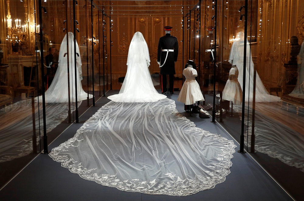 The wedding outfits of Meghan, Duchess of Sussex, and Harry, Duke of Sussex, are on display ahead of the exhibition A Royal Wedding, soon to open at Windsor Castle, in Windsor October 25, 2018. — Reuters pic