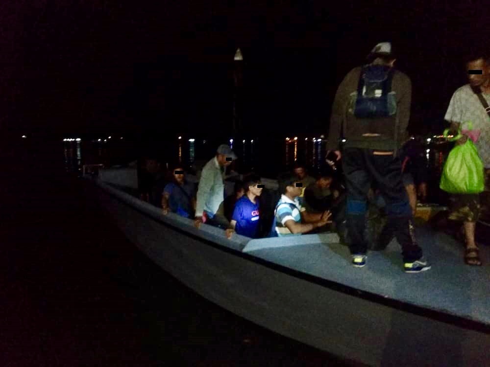 Some of the 92 Indonesian illegal immigrants who were caught by the MMEA in the waters off Tanjung Lompat in Desaru last night. u00e2u20acu201d Picture courtesy of the Malaysian Maritime Enforcement Agency (MMEA)