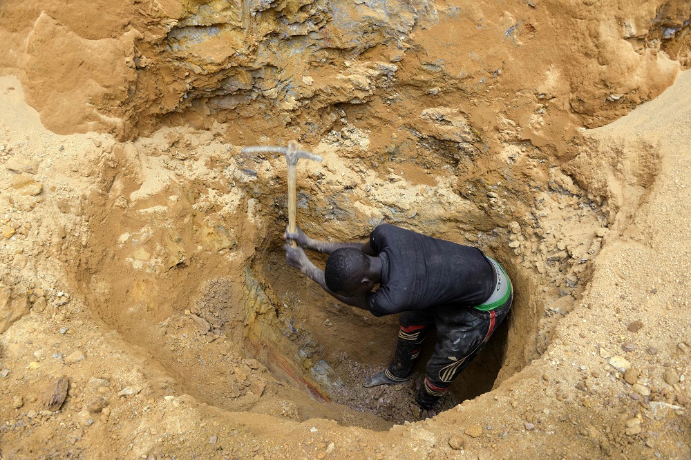 In this photograph taken on April 4, 2018, a gold miner digs at a mining site in the Cameroon town of Betare Oya. u00e2u20acu201d AFP pic  