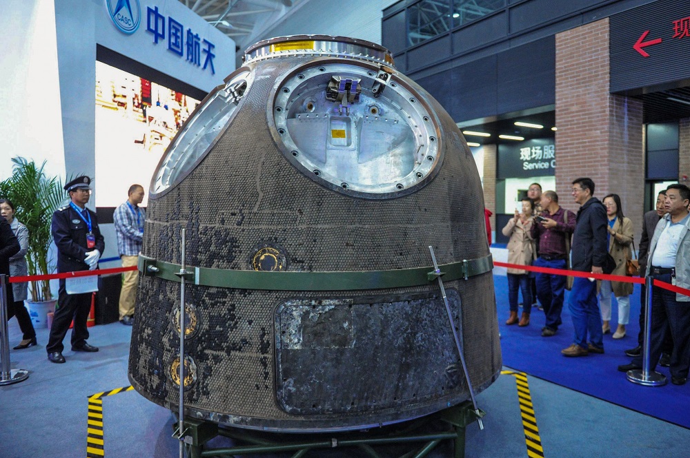 This photo taken on October 10, 2018, shows a satellite return capsule displayed on an exhibition of technological achievements on military and civilian uses in Qingdao, in Chinau00e2u20acu2122s eastern Shandong province. u00e2u20acu201d AFP pic  