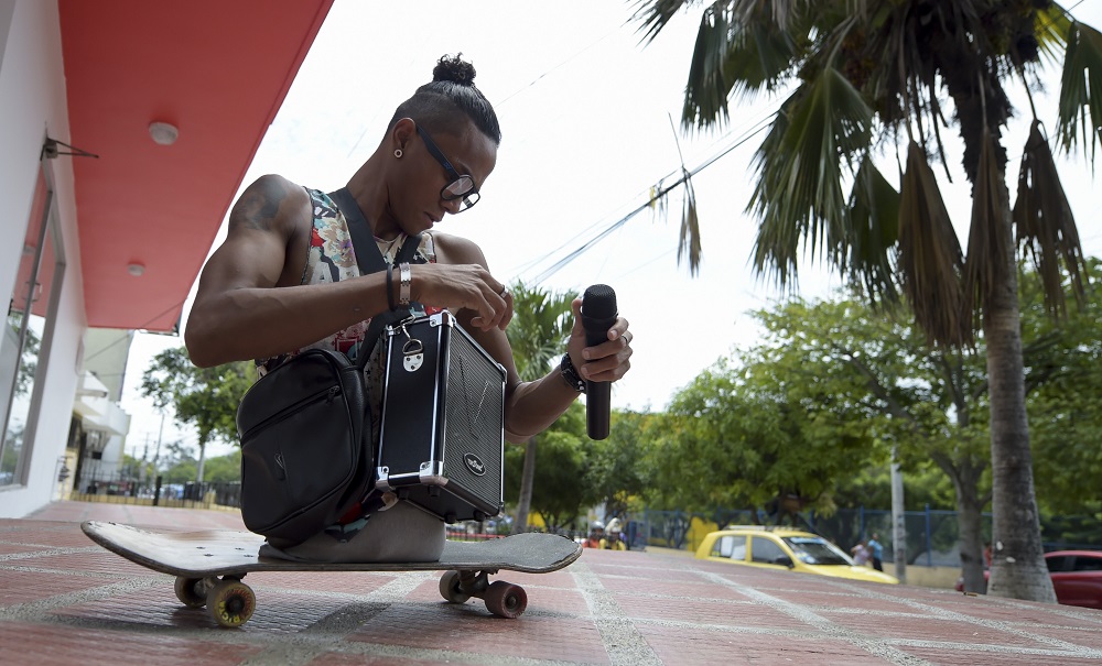 Venezuelan migrant and rap singer Alfonso Mendoza aka ‘Alca’, 25, gets ready before leaving to perform in public transportation, in Barranquilla, Colombia September 28, 2018. — AFP pic 