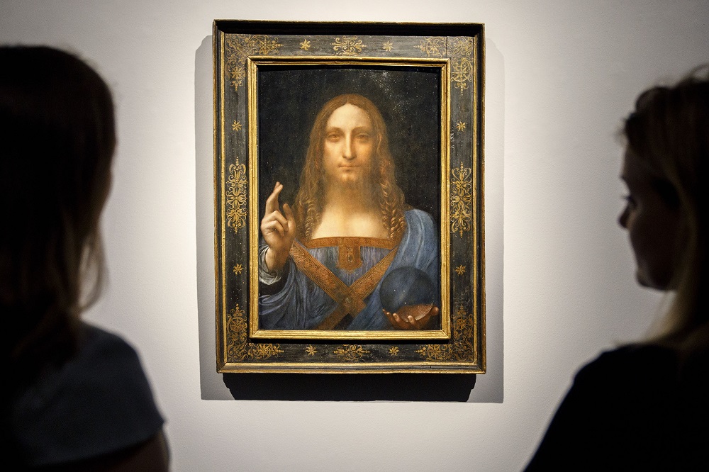 A painting entitled u00e2u20acu02dcSalvator Mundiu00e2u20acu2122 by Italian polymath Leonardo da Vinci, seen here at Christie's in 2017, was among the images considered by researchers investigating whether da Vinci had exotropic strabismus. u00e2u20acu201d AFP pic