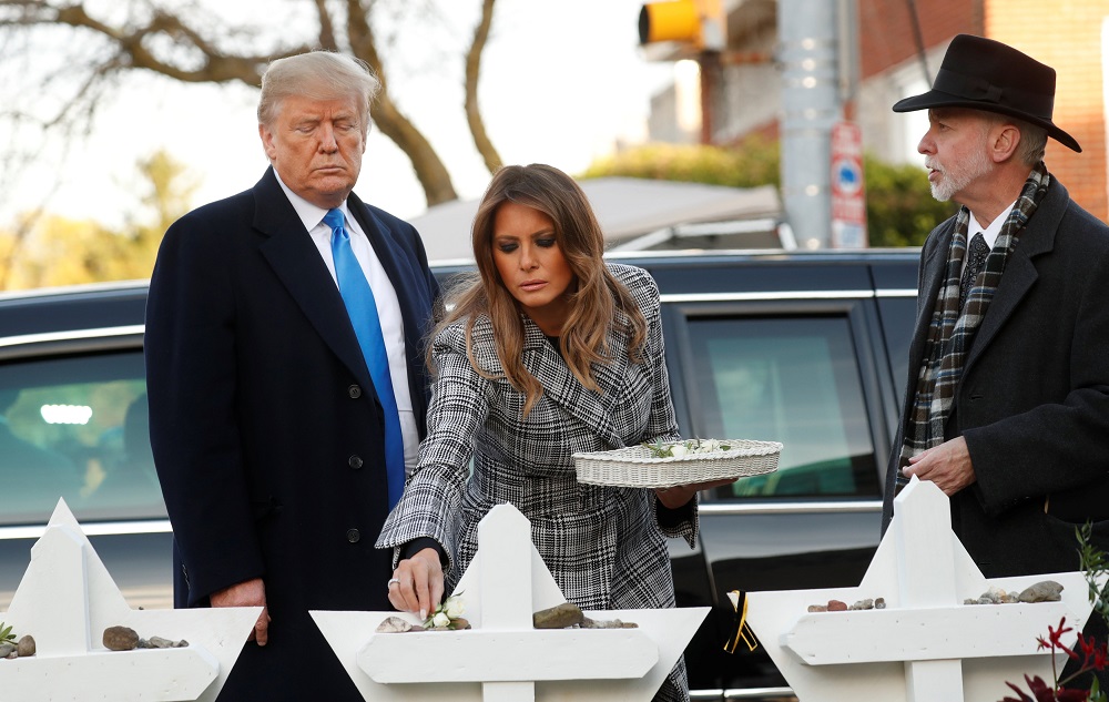 US President Donald Trump and first lady Melania Trump place stones on a memorial to shooting victims as they stand with Tree of Life Synagogue Rabbi Jeffrey Myers in Pittsburgh, Pennsylvania, October 30, 2018. u00e2u20acu201d Reuters pic
