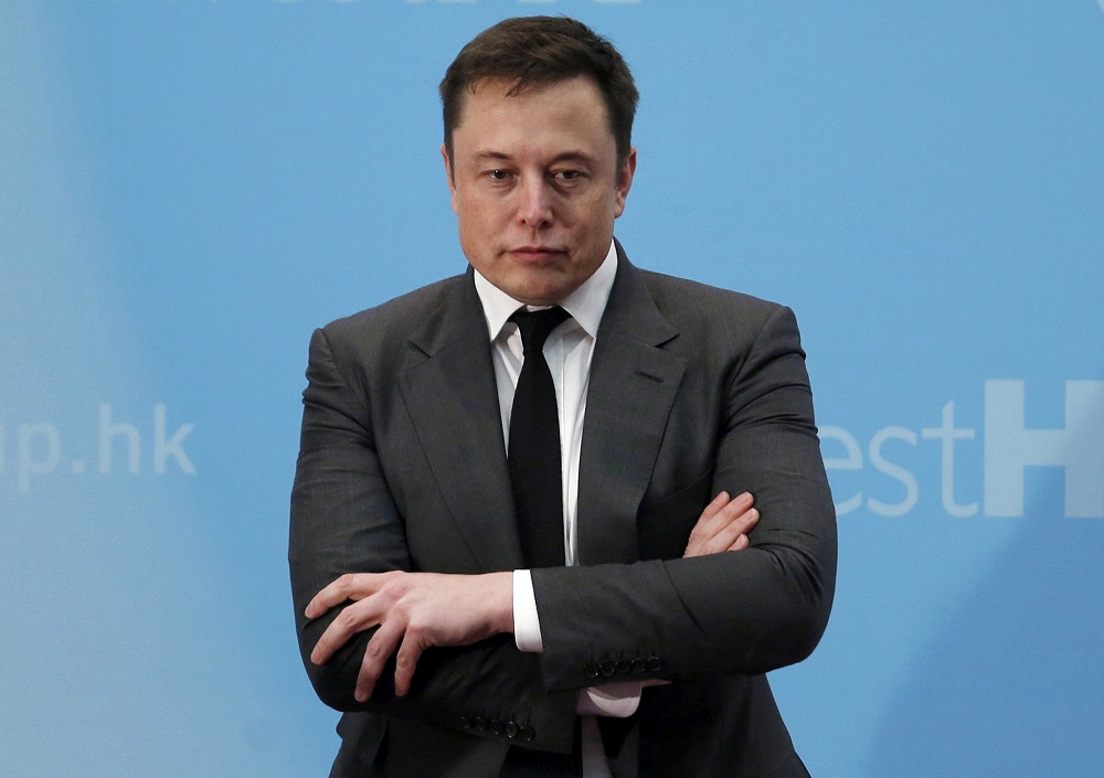 Tesla chief executive Elon Musk stands on the podium as he attends a forum on startups in Hong Kong, China January 26, 2016. u00e2u20acu201d Reuters pic