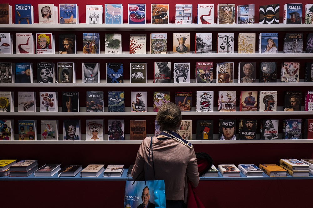 In this file photo taken on October 11, 2017 a visitor browses books at the stand of German publisher Taschen at the Frankfurt Book Fair 2017 in Frankfurt am Main, central Germany. u00e2u20acu201d AFP pic 