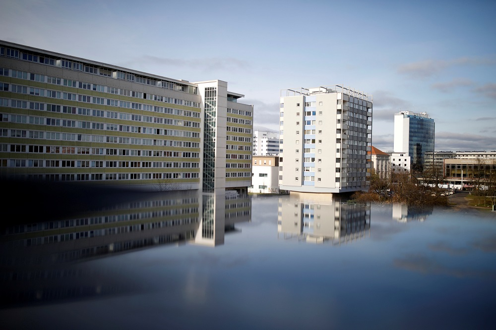 Residential buildings are reflected in a puddle in Cottbus, Germany January 24, 2018. u00e2u20acu201d Reuters pic