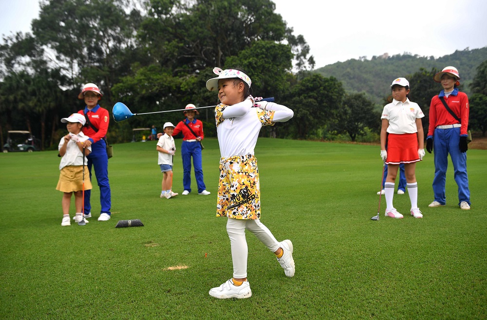 This picture taken on September 23, 2018, shows Lai Runci teeing off during a children's golf tournament at the Dragon Lake Golf Club in Guangzhou. u00e2u20acu201d AFP pic    