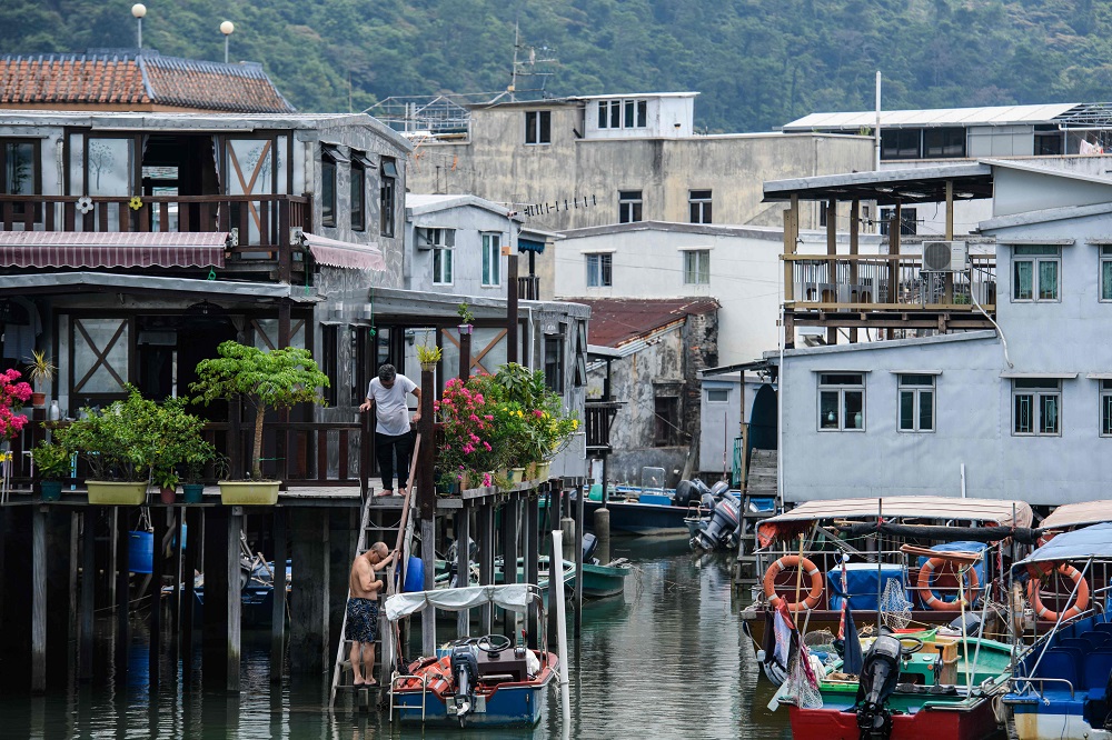 Residents walk down a ladder to a boat in the fishing village of Tai O in Hong Kong September 15, 2018. u00e2u20acu201d AFP pic