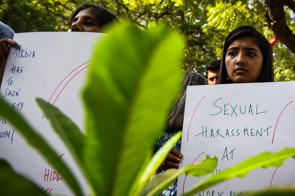 Indian journalists hold placards at a protest against sexual harassment in the media industry in New Delhi October 13, 2018. u00e2u20acu201d AFP pic    